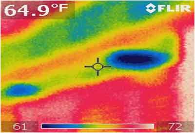 thermal imaging during an energy audit showing air leaks